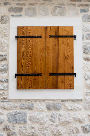 Old wooden medieval doors in the old town of Kotor Montenegro.の写真素材