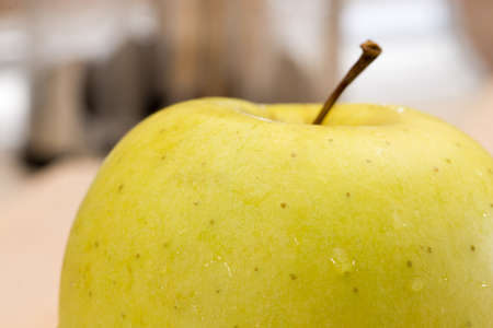 Yellow green delicious sweet apples.の写真素材
