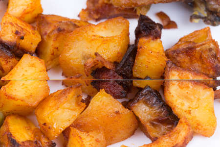 Macro view of roasted potatoes.