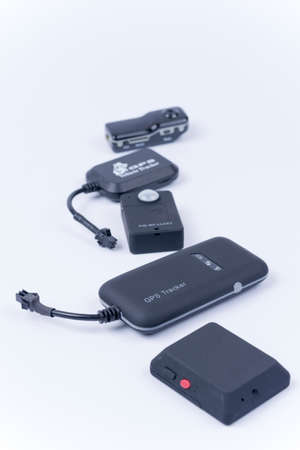 Spy bugs and hidden camera isolated over white.の写真素材