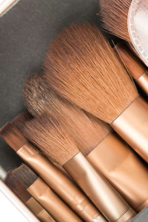 Macro shot of cosmetic makeup brushes.