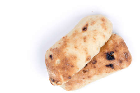 Flat lay balkan somun bread over white.の写真素材