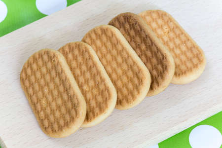 Flat lay image biscuits on the wooden board
