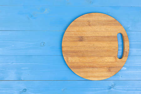 Top view flat lay round wooden cutting board food concept background.の写真素材