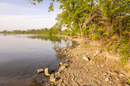 Sunset on the Danube river with beautiful blue cloudy skyの写真素材