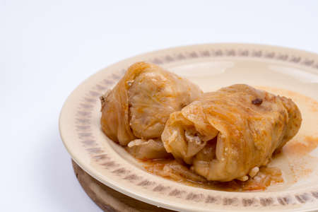 Serbian sarma meal in the plate. Minced meat with rice in sour cabbage.の写真素材