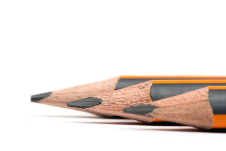 Wooden pencils over white background
