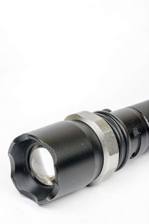 Black police torchlight over white background