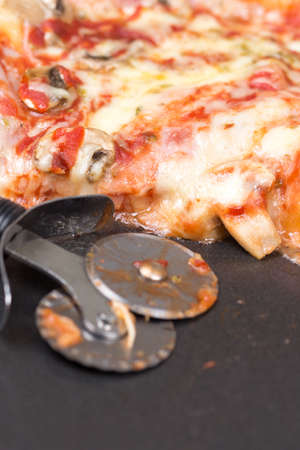 Closeup macro view pizza slice melted cheeseの写真素材