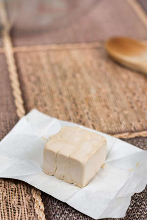 Piece of yeast on the tableの写真素材