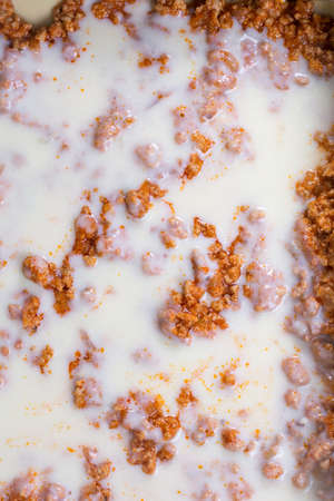 Bechamel sauce with stewed meat and preparing lasagnaの写真素材