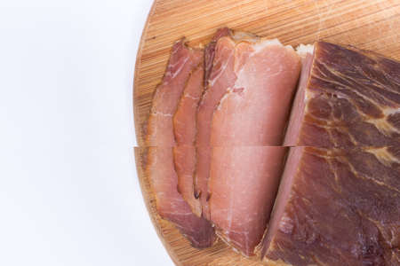 Flat lay copy space sliced smoked sirloin on the wooden board