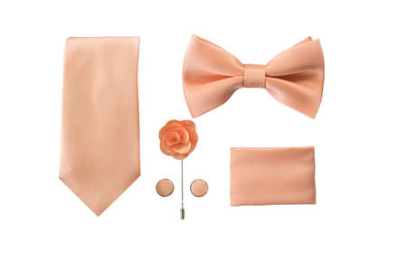 Set with tie bow tie cufflinks handkerchief and lapel isolated above white backgroundの写真素材