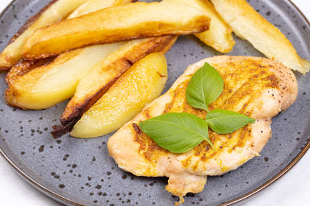 Fried Chicken Breasts with mustard and cheeseの写真素材