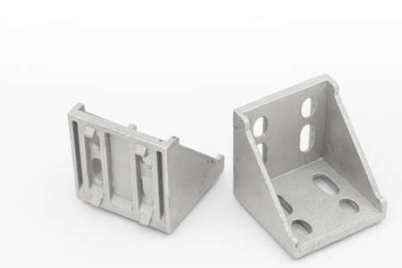 Alluminum construction connecting angles above white background.
