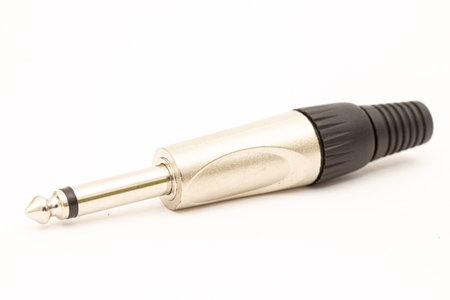 Audio 6.5 mm jack cable connector above white background.