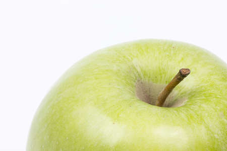 Fresh raw green apple isolated above white background with copy space.の写真素材