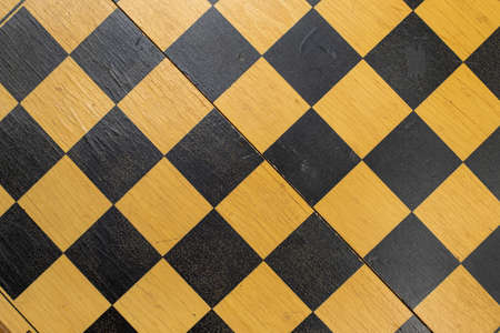 Wooden Chess board above white background.の写真素材