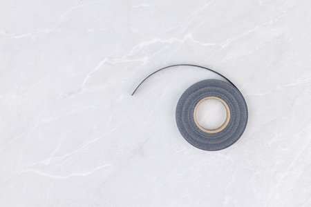 Duck Tape with copy space above grey tableの写真素材