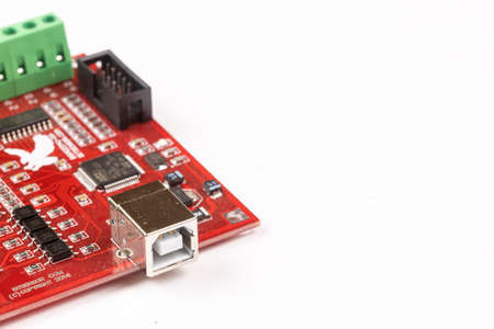 CNC motherboard isolated above white background.