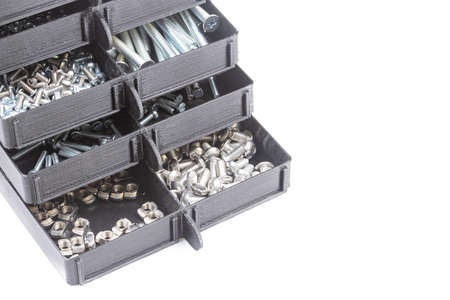 Boxes full with nuts and bolts. Workshop concept with tool boxの写真素材