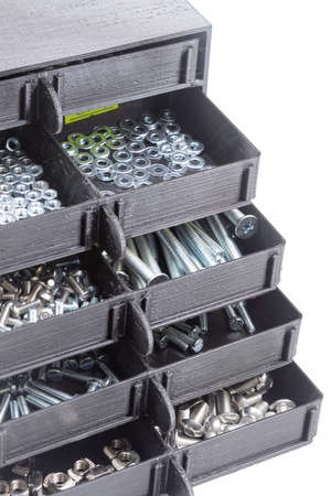 Boxes full with nuts and bolts. Workshop concept with tool boxの写真素材