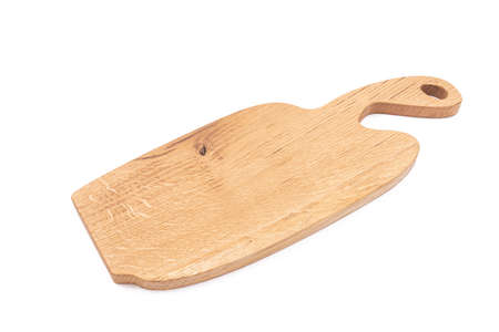 Wooden cutting board isolated above white background.の写真素材