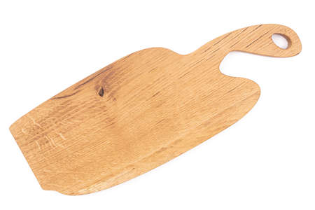 Wooden cutting board isolated above white background.の写真素材