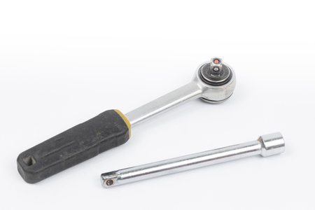 Close-up ratchet wrench. Professional tool. Isolated on a black backgroundの写真素材