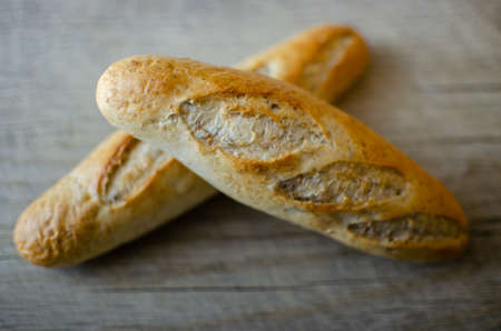fresh bread on oak cutting board
