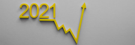 Economic recovery after the crisis. Economic growth concept, histogram of the economy with an upward arrow.の写真素材