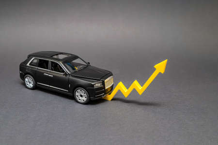 Rising cost of new and used cars, rising car sales, rising costs of insurance and car loans. Rising car prices.の写真素材