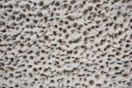 Concrete texture in holes, concrete texture of an old buildingの写真素材