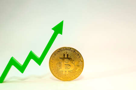 Bitcoin price. Cryptocurrency rate on the price chart, the arrow points up. On white background copy spaceの写真素材