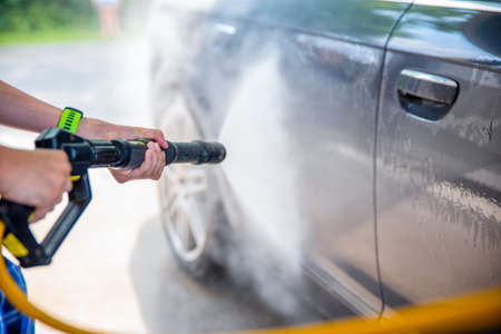 Car wash. Car care, car wash cost and car wash services. Copy space