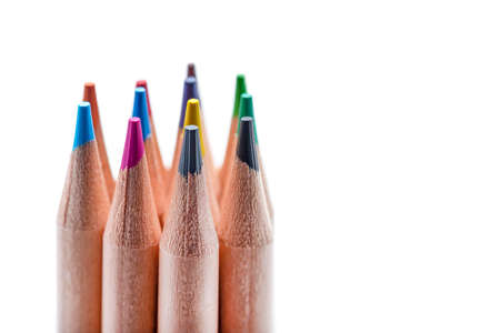 Isolate of multicolored wooden pencils. Pencils of different colors stand out against a uniform...