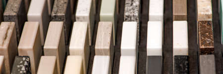 Samples of decorative artificial stone, close-up. Stone samples for kitchen countertops or bathroom, modern interior designの写真素材