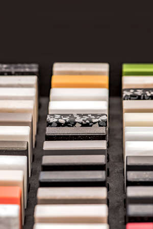 Samples of decorative artificial stone, close-up. Stone samples for kitchen countertops or bathroom, modern interior designの写真素材
