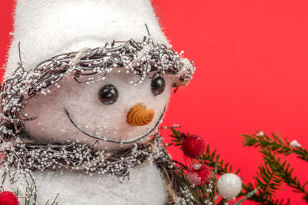Snowman on a red background. christmas concept. Christmas card with copy space. Happy New Year