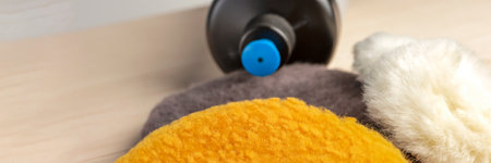 Car polishing pads. Polishing pads for polishing and waxing a car made of multi-colored wool for a polishing machineの写真素材