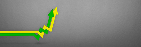 Inflation, rising inflation. Rising prices. Yellow and green arrows intertwined on the chart pointing up, gray background. Growth conceptの写真素材