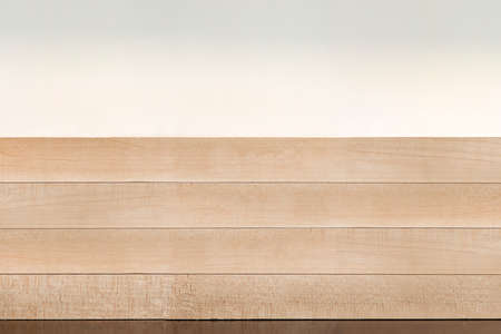 Wooden board background. Perspective of a wooden table for your layout or product presentationの写真素材