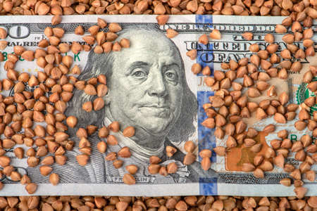 Buckwheat prices. World food crisis. Financial derivatives market. One hundred dollar bill in buckwheat.の写真素材