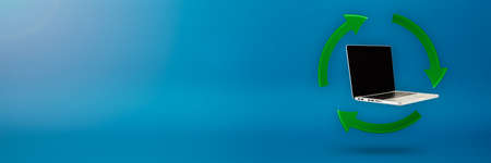 Electronics recycling. Green recycling 3d symbol. Arrows around consumer electronics on a blue background.の写真素材