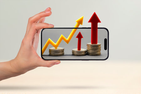 Financial market, purchase of shares, annual or quarterly reports of companies. Forecast of growth in the financial market. Phone in hand, financial graph and growth chart on phone screenの写真素材