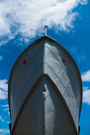 Military ship`s prow on the blue sky background の写真素材