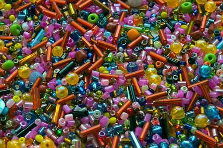 Heap of multicolor beads different formsの写真素材