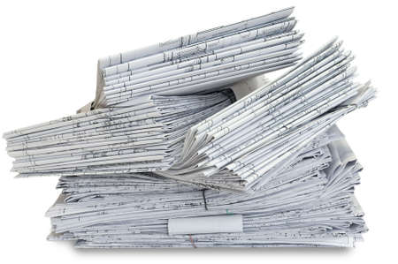 Stack of design drawings on a table. Isolated over white backgroundの写真素材