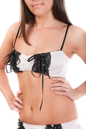 Beautiful thin body of the woman in sexual underwear, unrecognizable. Isolated on white backgroundの写真素材