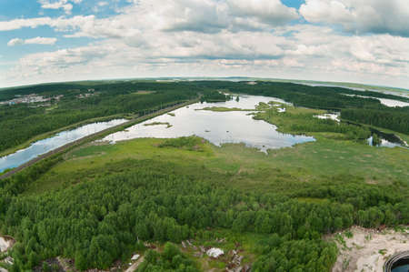 Railway between forests and lakes. Air viewの写真素材
